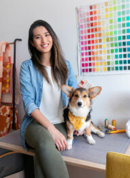 Wendy Chow with her dog and sewing machine